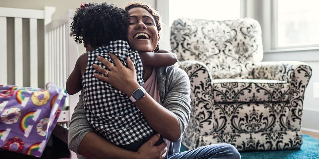 young mother hugs her child