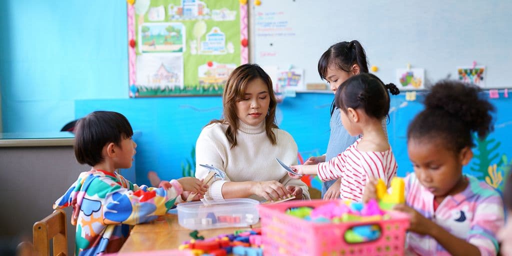 preschoolers learn through playing together