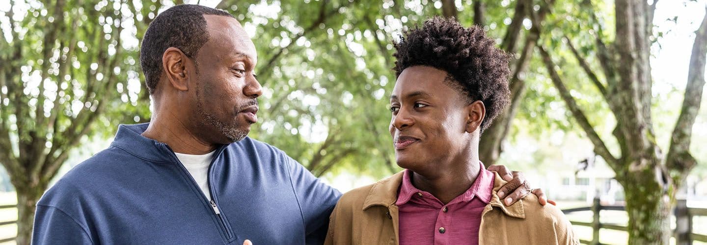 father and son go for a walk and have a conversation