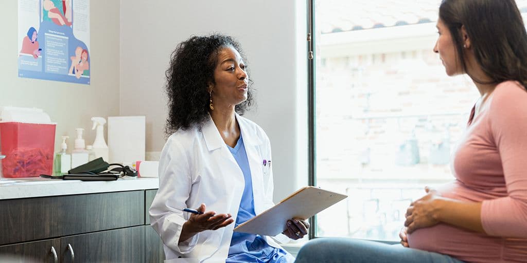 a doctor advises her patient