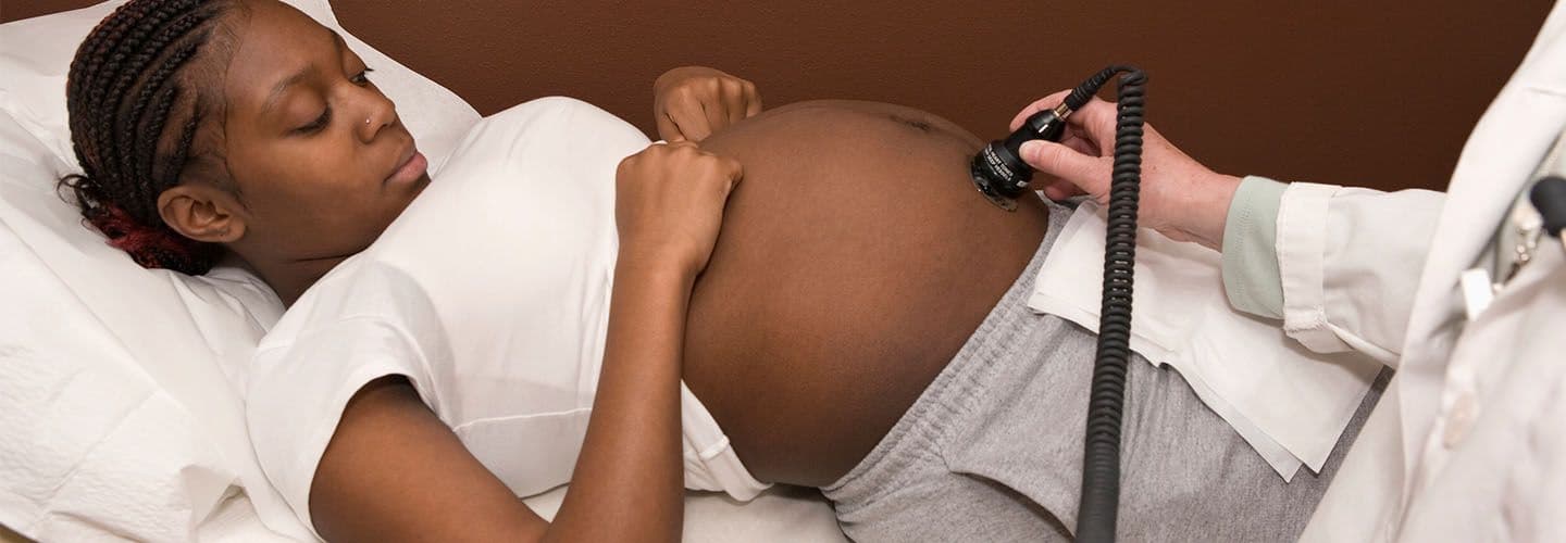 a young pregnant woman gets an ultrasound